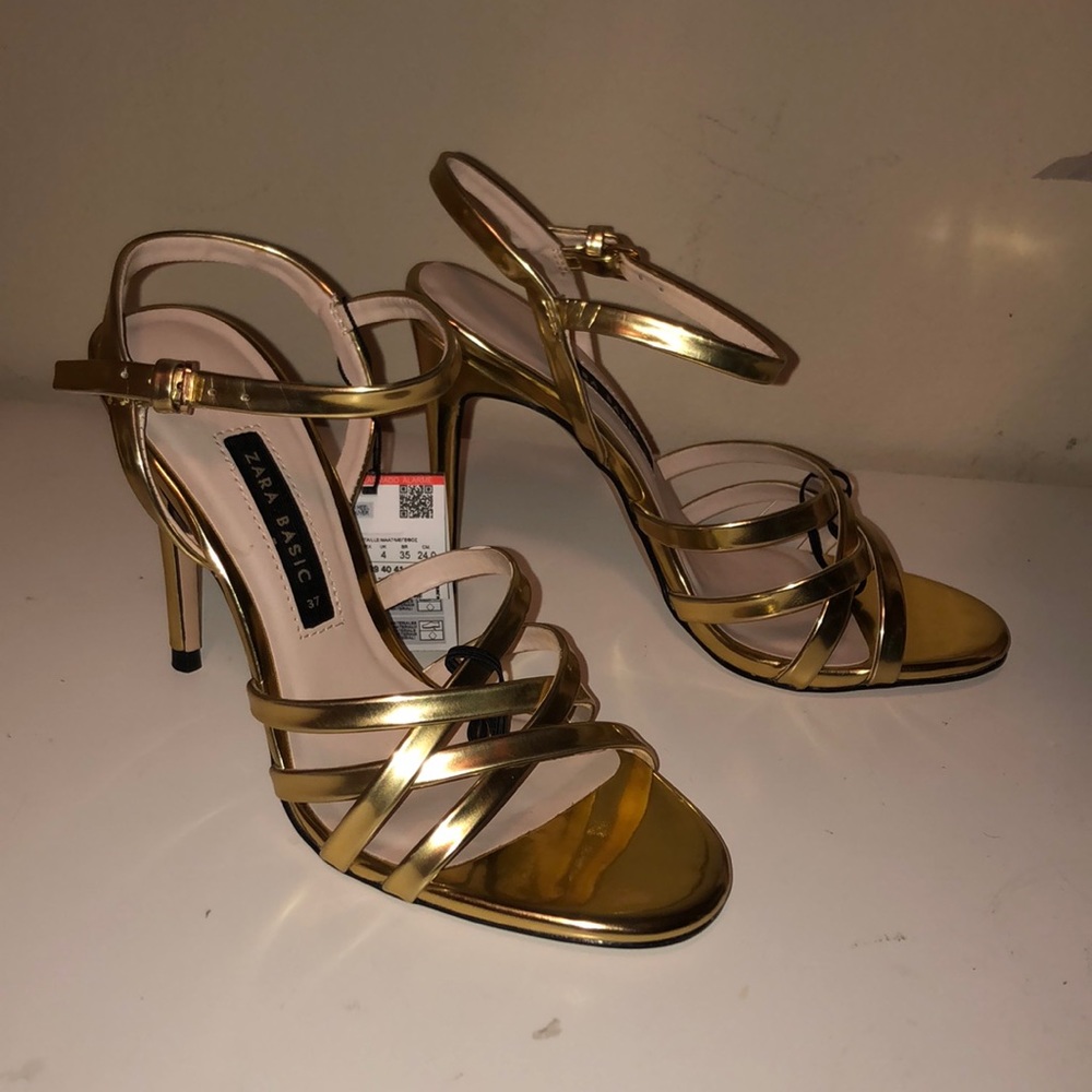 Gold strappy heels